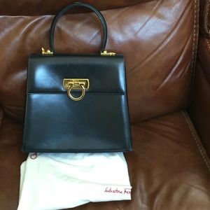 Authentic Salvatore Ferragamo Kelly Bag in Navy blue with gold hard ware